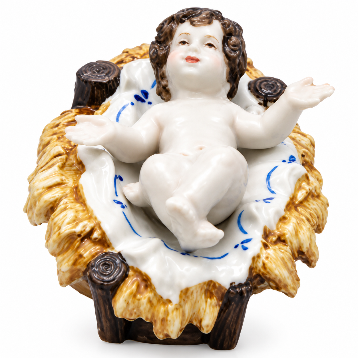 Bambin gesù in porcellana nella mangiatoia per presepe