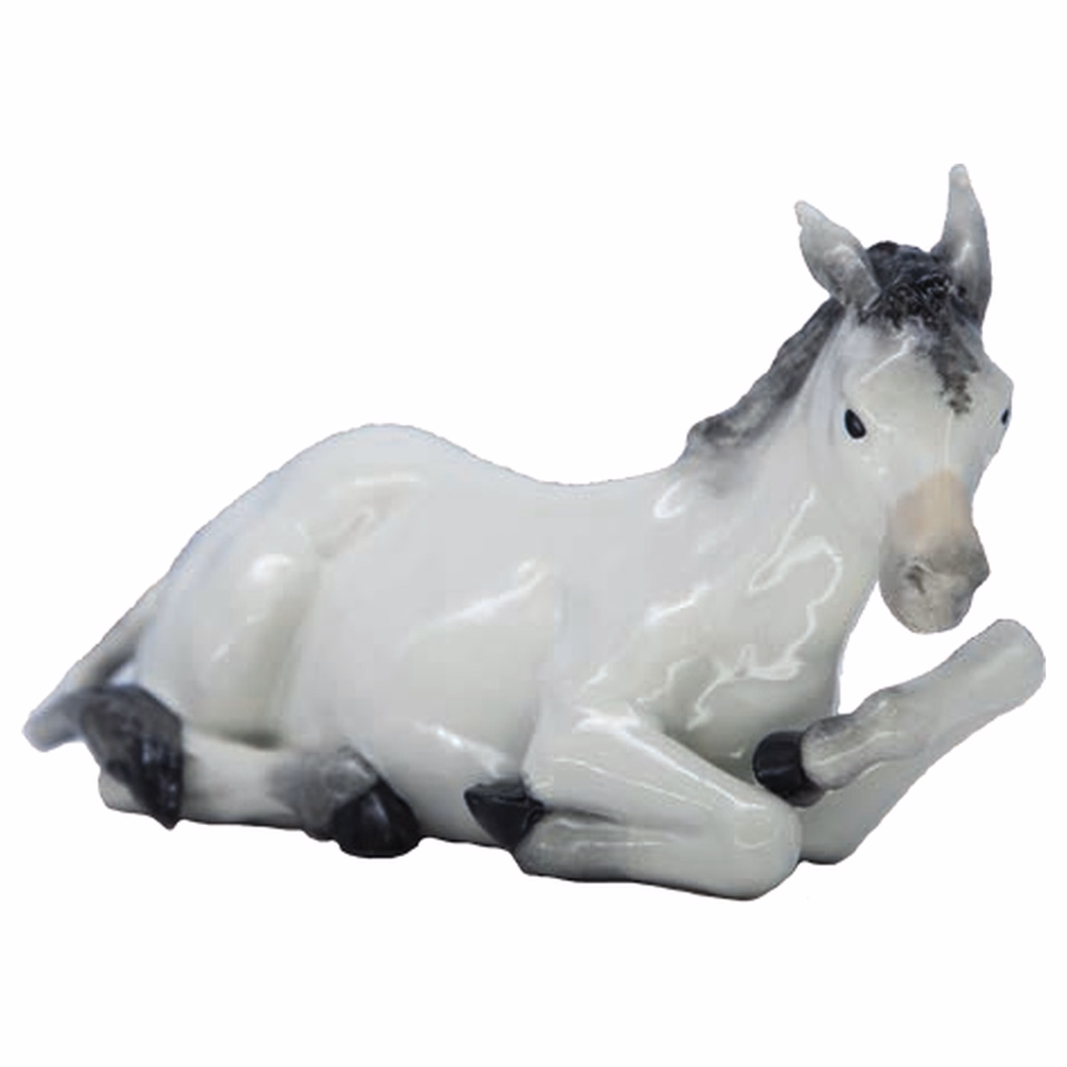 Asinello per presepe in porcellana accovacciato bianco e grigio